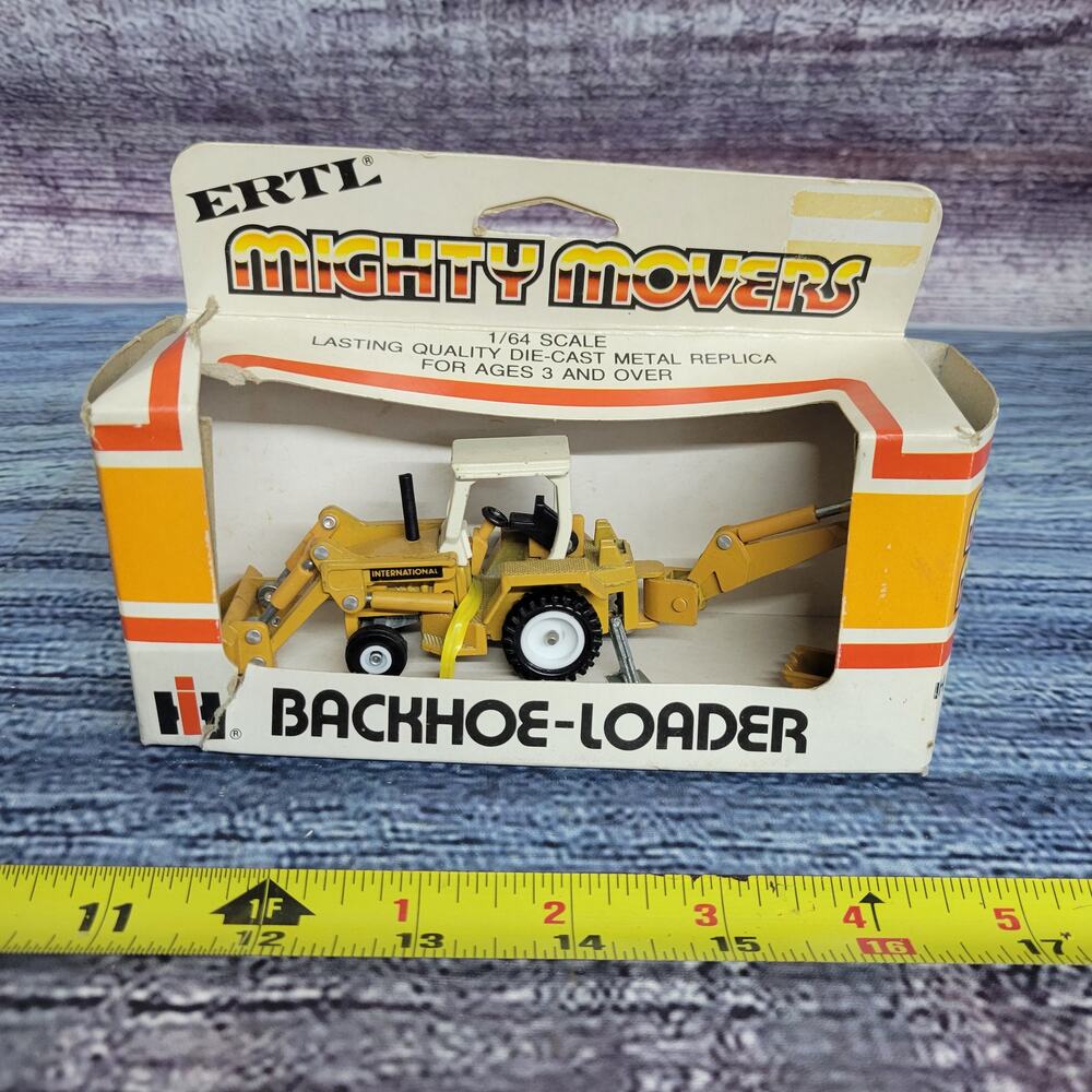 Vtg Ertl mighty movers 1/64 scale International Harvester diecast backhoe/loader